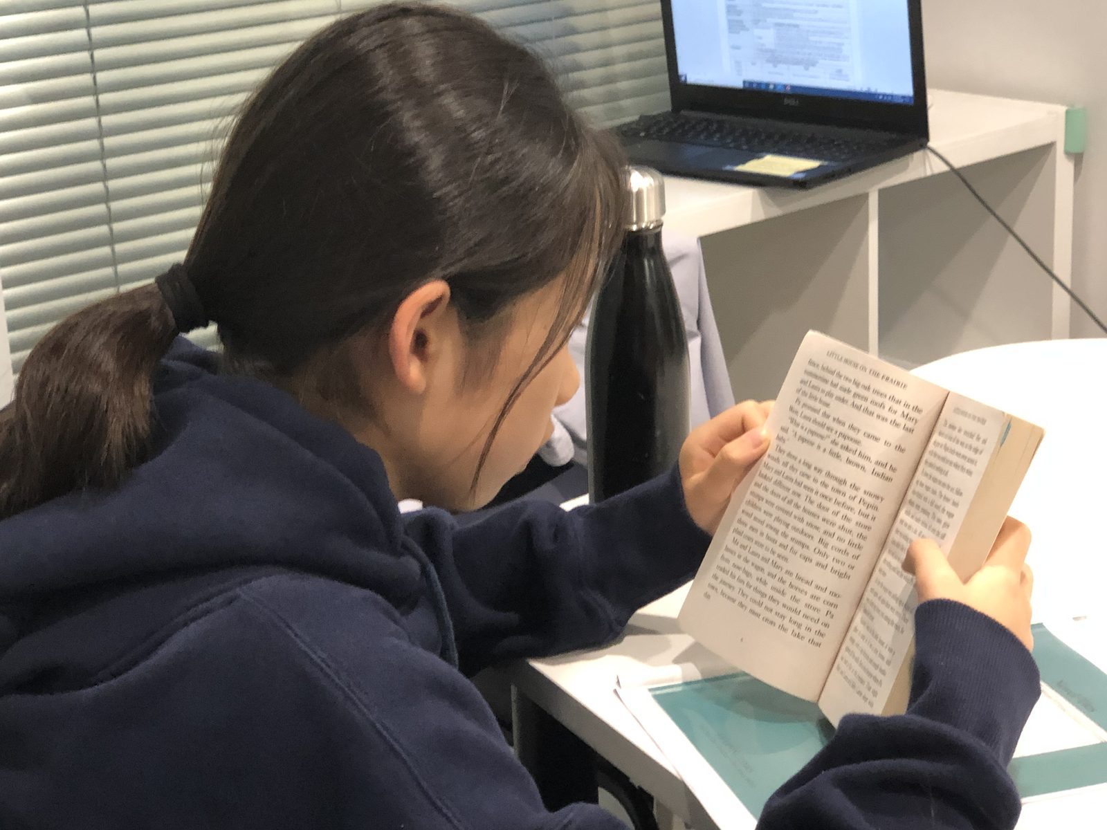 A Teens Canon student reading